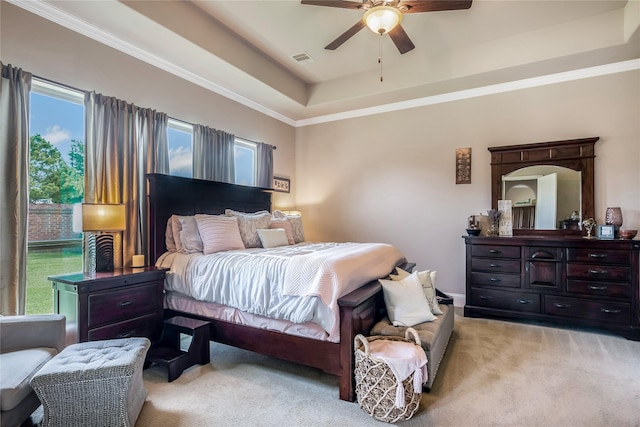 10040 Easton Sky Ln, Cypress, TX 77433 - bedroom featuring light colored carpet, a raised ceiling, ornamental molding, and ceiling fan