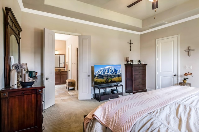 10040 Easton Sky Ln, Cypress, TX 77433 - bedroom featuring light colored carpet, a raised ceiling, crown molding, and connected bathroom