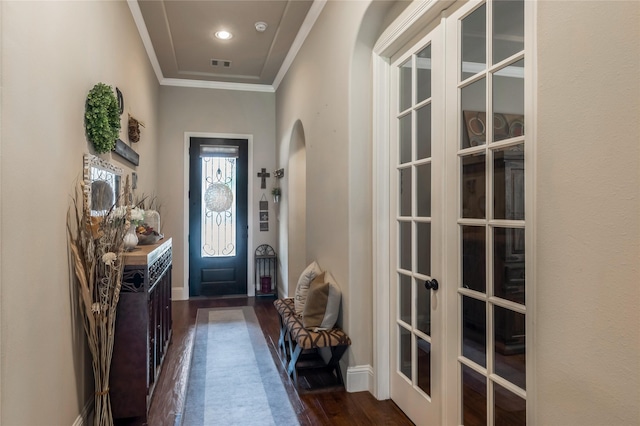 10040 Easton Sky Ln, Cypress, TX 77433 - doorway to outside with arched walkways, dark wood-type flooring, french doors, ornamental molding, and baseboards