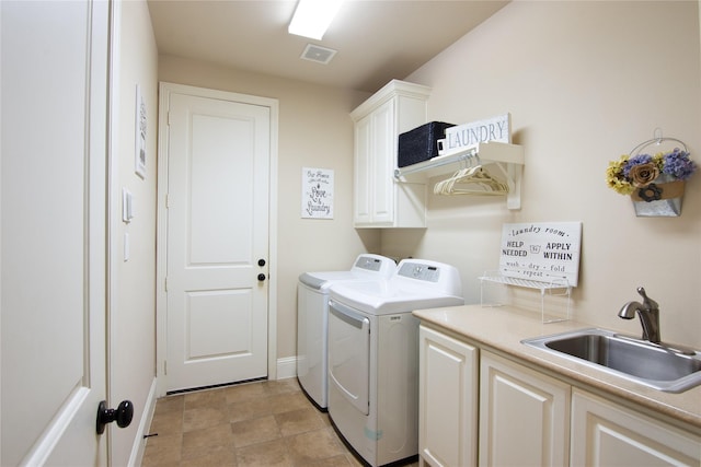10040 Easton Sky Ln, Cypress, TX 77433 - washroom featuring cabinet space and washing machine and clothes dryer