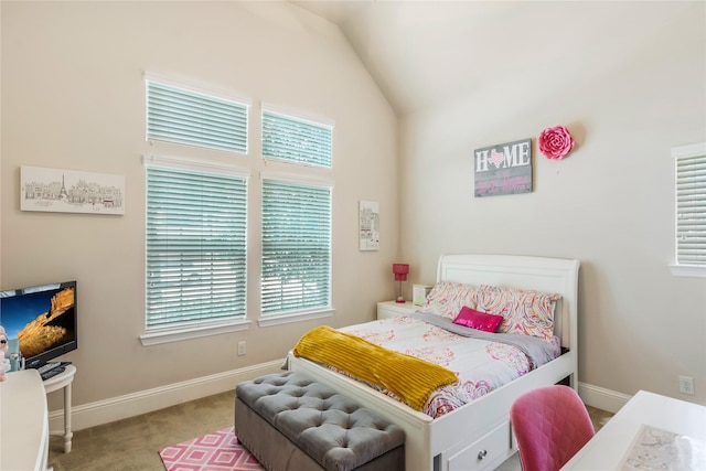 10040 Easton Sky Ln, Cypress, TX 77433 - carpeted bedroom with multiple windows, baseboards, and vaulted ceiling