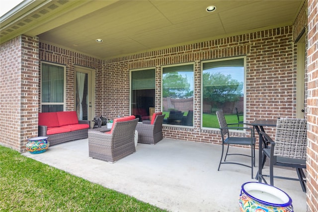 10040 Easton Sky Ln, Cypress, TX 77433 - view of patio / terrace featuring outdoor lounge area