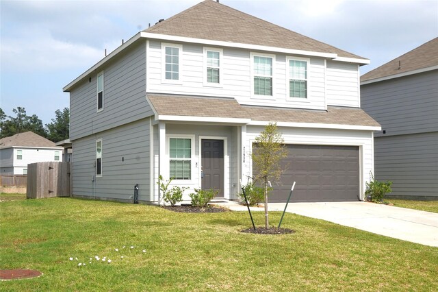 21930 King Heights Ln, Houston, TX 77073 - view of front of home featuring a garage, roof with shingles, and driveway