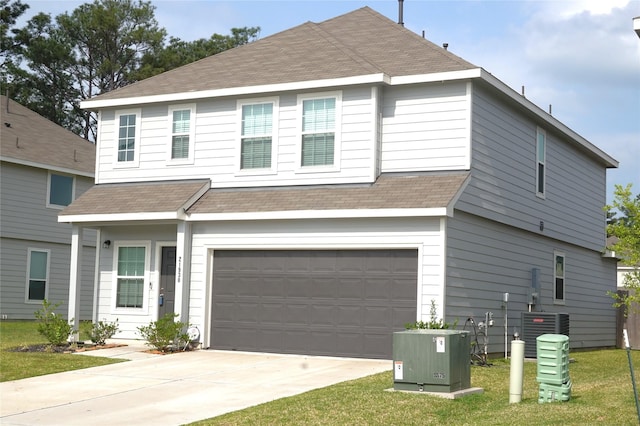 21930 King Heights Ln, Houston, TX 77073 - view of front of home with a garage, roof with shingles, central air condition unit, driveway, and a front lawn