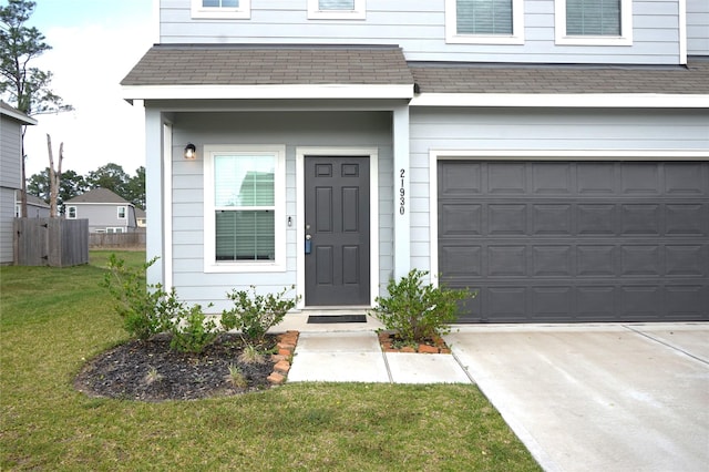 21930 King Heights Ln, Houston, TX 77073 - doorway to property with an attached garage, concrete driveway, and a shingled roof