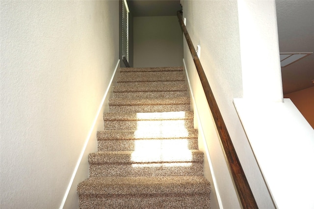 21930 King Heights Ln, Houston, TX 77073 - stairway with a textured wall