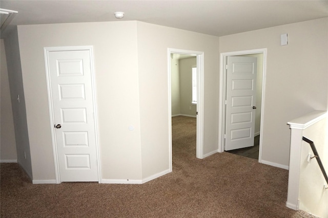 21930 King Heights Ln, Houston, TX 77073 - corridor featuring carpet floors, baseboards, and an upstairs landing