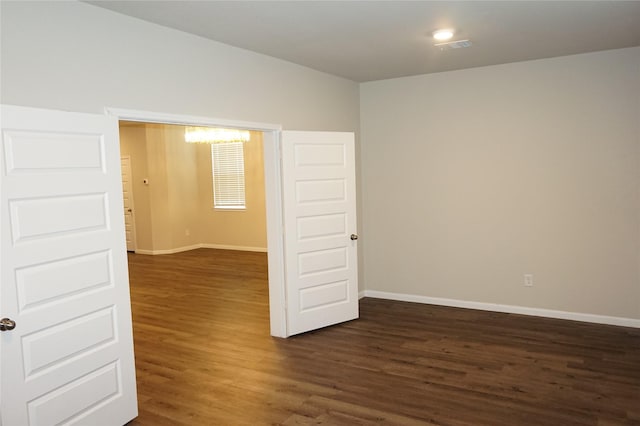 21930 King Heights Ln, Houston, TX 77073 - spare room featuring dark wood-style floors and baseboards