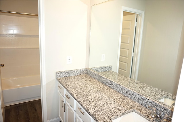 21930 King Heights Ln, Houston, TX 77073 - full bath featuring vanity, tub / shower combination, and wood finished floors