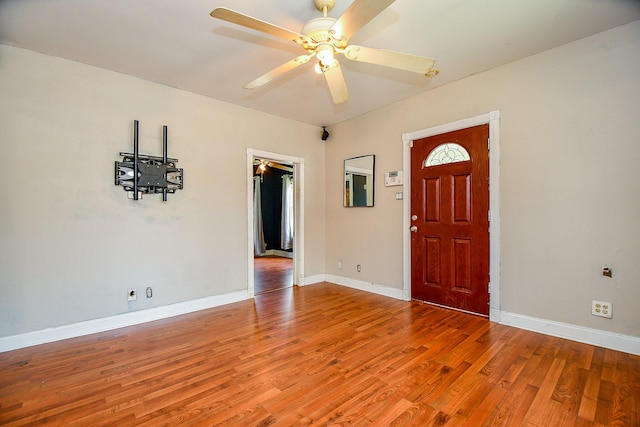 101 Emerald Ct, Houston, TX 77009 - foyer entrance featuring ceiling fan, wood finished floors, and baseboards