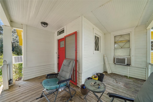 855 County Road 15, Damon, TX 77430 - wooden porch with cooling unit