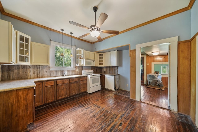 855 County Road 15, Damon, TX 77430 - kitchen with white appliances, cream cabinetry, dark wood-style floors, a ceiling fan, and a sink