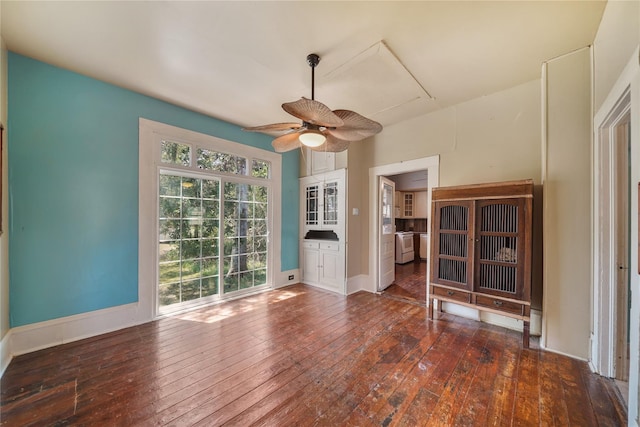 855 County Road 15, Damon, TX 77430 - unfurnished room featuring hardwood / wood-style floors, ceiling fan, attic access, and baseboards