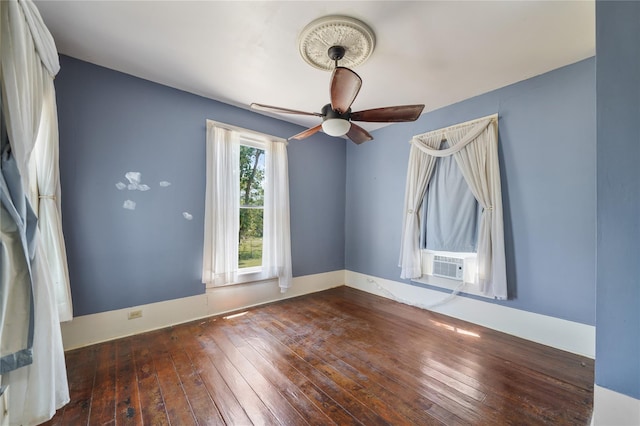 855 County Road 15, Damon, TX 77430 - empty room with hardwood / wood-style floors, a ceiling fan, cooling unit, and baseboards