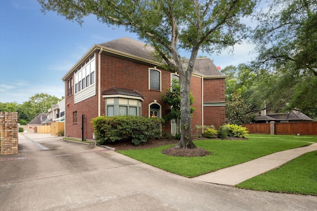 210 Victoria Way, Friendswood, TX 77546 - view of front of home with brick siding and driveway
