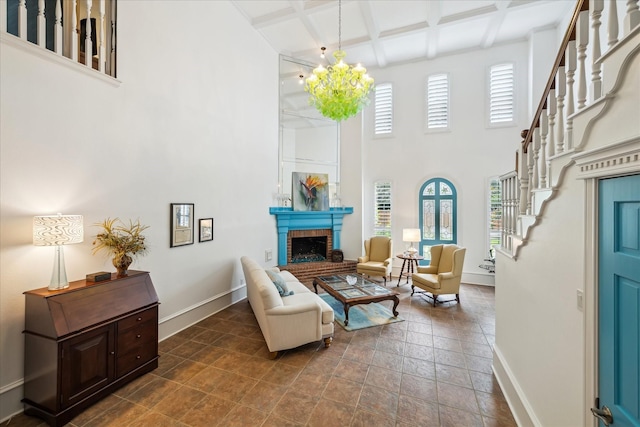 210 Victoria Way, Friendswood, TX 77546 - living area with a towering ceiling, coffered ceiling, baseboards, a brick fireplace, and beamed ceiling