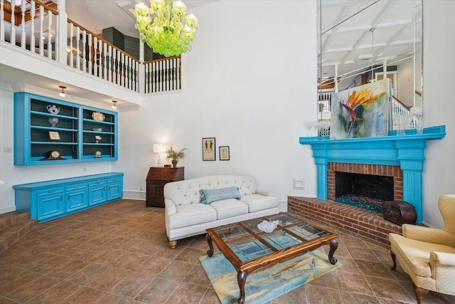 210 Victoria Way, Friendswood, TX 77546 - living room with stone finish flooring, a towering ceiling, and a fireplace