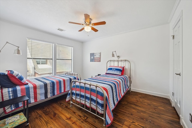 210 Victoria Way, Friendswood, TX 77546 - bedroom with wood finished floors, baseboards, and a ceiling fan