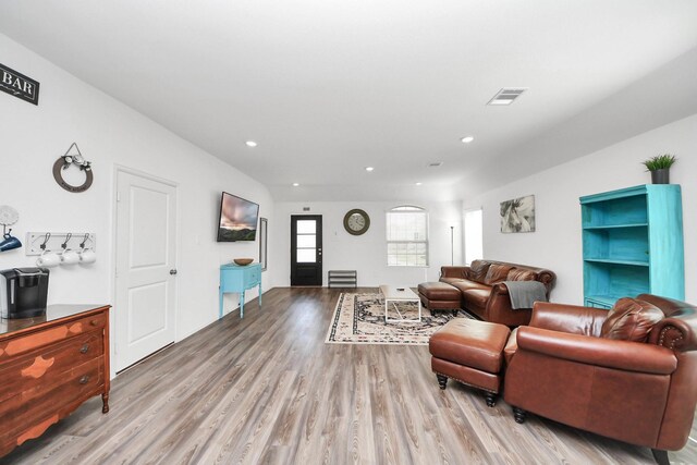 2947 Palominos Way, Conroe, TX 77301 - living area featuring wood finished floors and recessed lighting