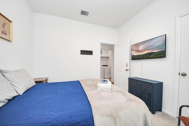 2947 Palominos Way, Conroe, TX 77301 - carpeted bedroom featuring washer / dryer