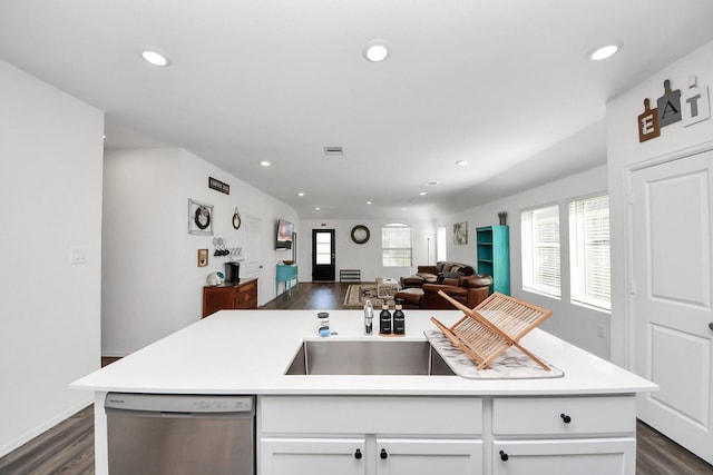 2947 Palominos Way, Conroe, TX 77301 - kitchen with dishwasher, dark wood-type flooring, open floor plan, white cabinetry, and recessed lighting