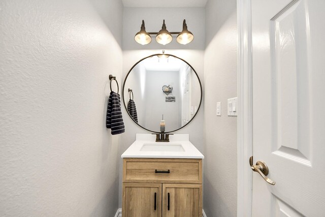 7519 Foster Creek Dr, Richmond, TX 77406 - bathroom with vanity and a textured wall