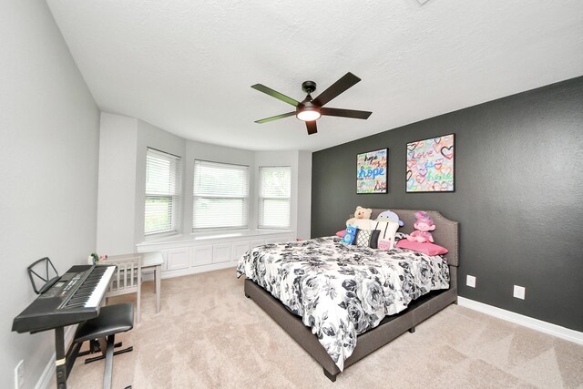 7519 Foster Creek Dr, Richmond, TX 77406 - bedroom featuring carpet, a ceiling fan, and a textured ceiling