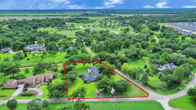 7519 Foster Creek Dr, Richmond, TX 77406 - aerial perspective of suburban area with property parcel outlined