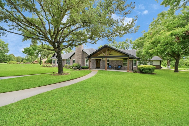7519 Foster Creek Dr, Richmond, TX 77406 - craftsman house with a front yard, roof mounted solar panels, and brick siding