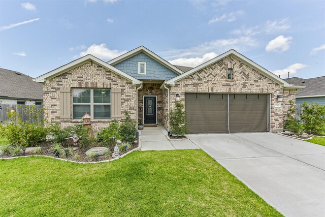 22107 Juniper Crossing Dr, New Caney, TX 77357 - view of front facade featuring driveway, a garage, and brick siding