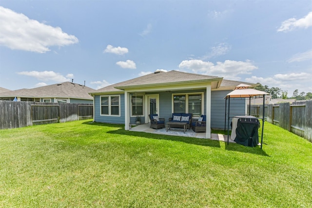 22107 Juniper Crossing Dr, New Caney, TX 77357 - back of house featuring an outdoor hangout area, a gazebo, and a patio