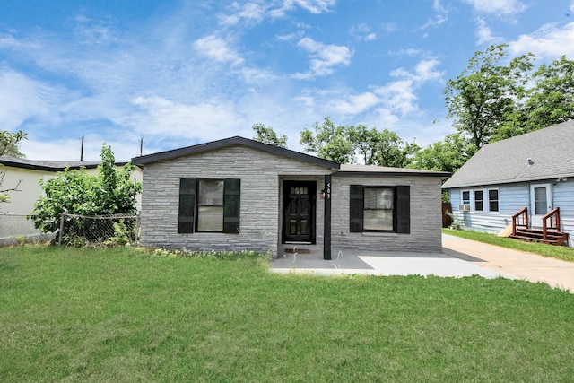 503 Schilling St, Baytown, TX 77520 - view of front of home with stone siding and a patio