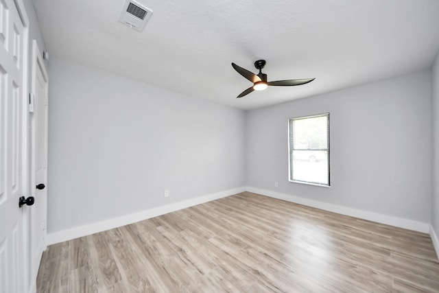 503 Schilling St, Baytown, TX 77520 - spare room with a ceiling fan, light wood-style flooring, and baseboards