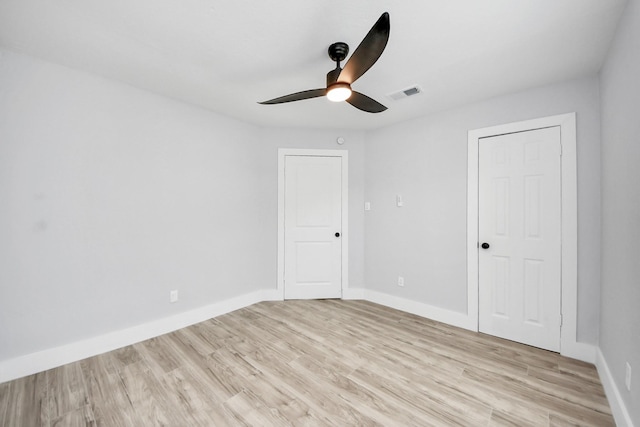 503 Schilling St, Baytown, TX 77520 - unfurnished bedroom with light wood-type flooring, baseboards, and ceiling fan