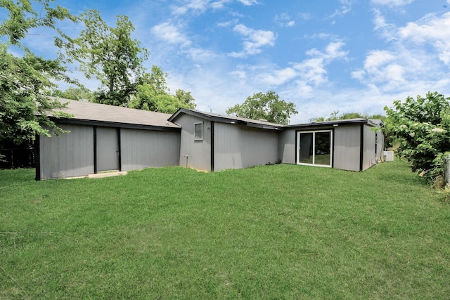 503 Schilling St, Baytown, TX 77520 - rear view of house with a yard