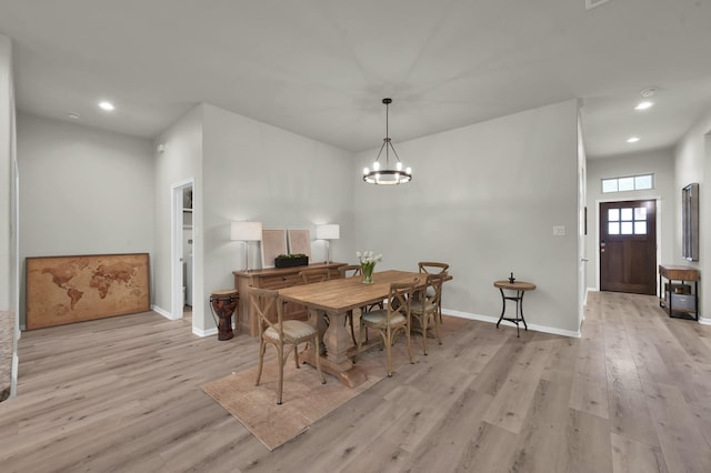 9203 White Tail Dr, Conroe, TX 77303 - dining room with light wood-type flooring, recessed lighting, and a chandelier