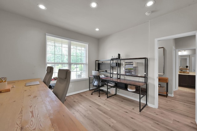 9203 White Tail Dr, Conroe, TX 77303 - home office with wood finished floors and recessed lighting