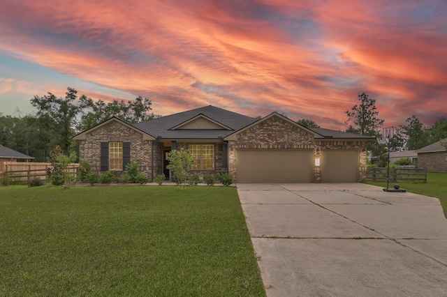 9203 White Tail Dr, Conroe, TX 77303 - ranch-style house with concrete driveway, an attached garage, stone siding, and roof with shingles