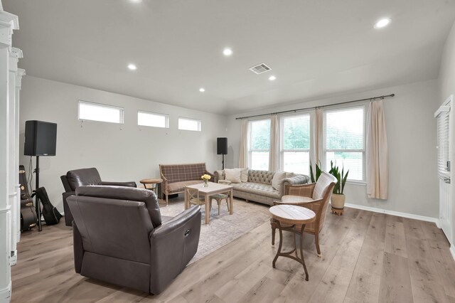 9203 White Tail Dr, Conroe, TX 77303 - living room featuring light wood-style floors and recessed lighting