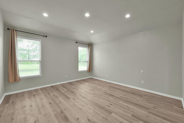 9203 White Tail Dr, Conroe, TX 77303 - unfurnished room with light wood-style floors and recessed lighting