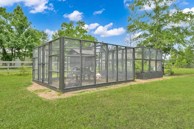 9203 White Tail Dr, Conroe, TX 77303 - view of poultry coop with a yard