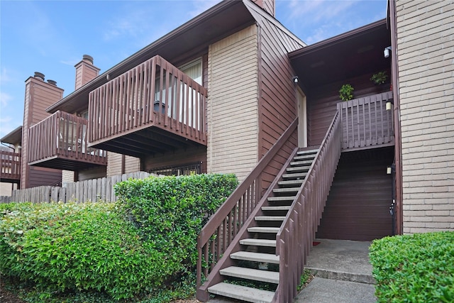 12905 Woodforest Blvd Unit 606, Houston, TX 77015 - view of home's exterior featuring stairs and brick siding