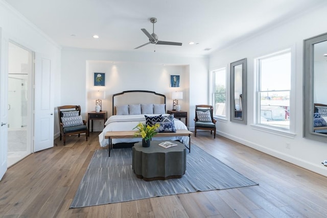 2209 Crocker St, Houston, TX 77006 - bedroom featuring wood finished floors, crown molding, recessed lighting, baseboards, and ceiling fan