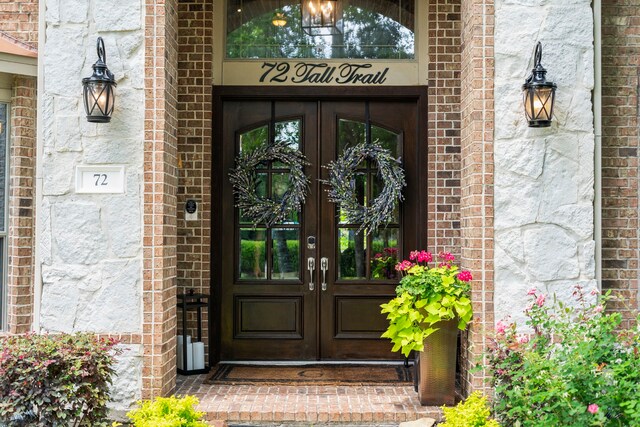 72 Tall Trl, Missouri City, TX 77459 - property entrance featuring french doors and brick siding