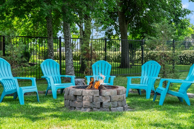 72 Tall Trl, Missouri City, TX 77459 - view of yard with an outdoor fire pit