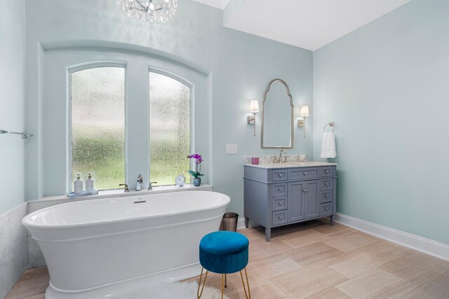 72 Tall Trl, Missouri City, TX 77459 - full bath featuring vanity and a freestanding tub