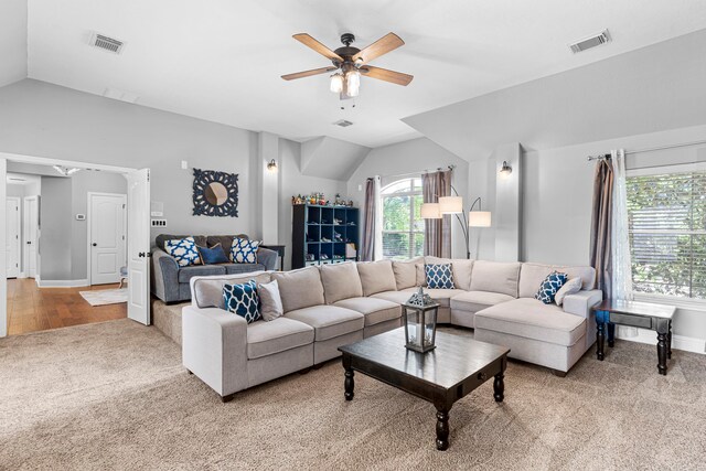 72 Tall Trl, Missouri City, TX 77459 - living room featuring lofted ceiling, light colored carpet, and ceiling fan