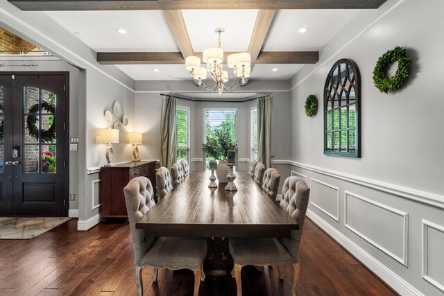 72 Tall Trl, Missouri City, TX 77459 - dining area featuring a chandelier, dark wood finished floors, beam ceiling, wainscoting, and coffered ceiling