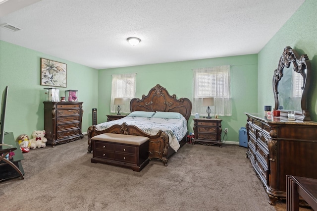 20407 Spoonwood Dr, Humble, TX 77346 - carpeted bedroom with a textured ceiling
