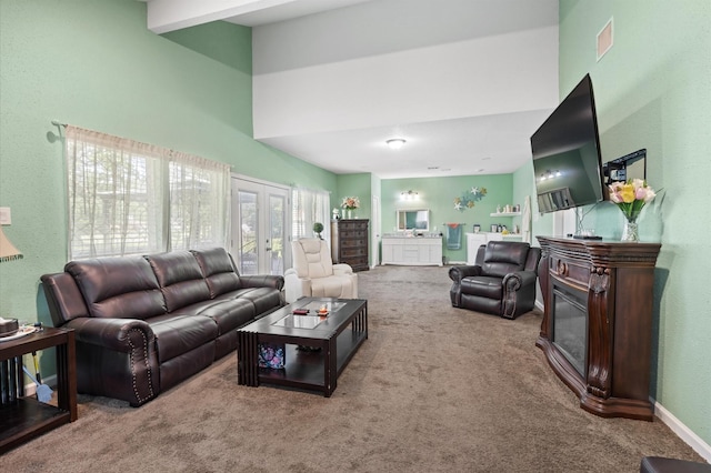 20407 Spoonwood Dr, Humble, TX 77346 - carpeted living area with a high ceiling